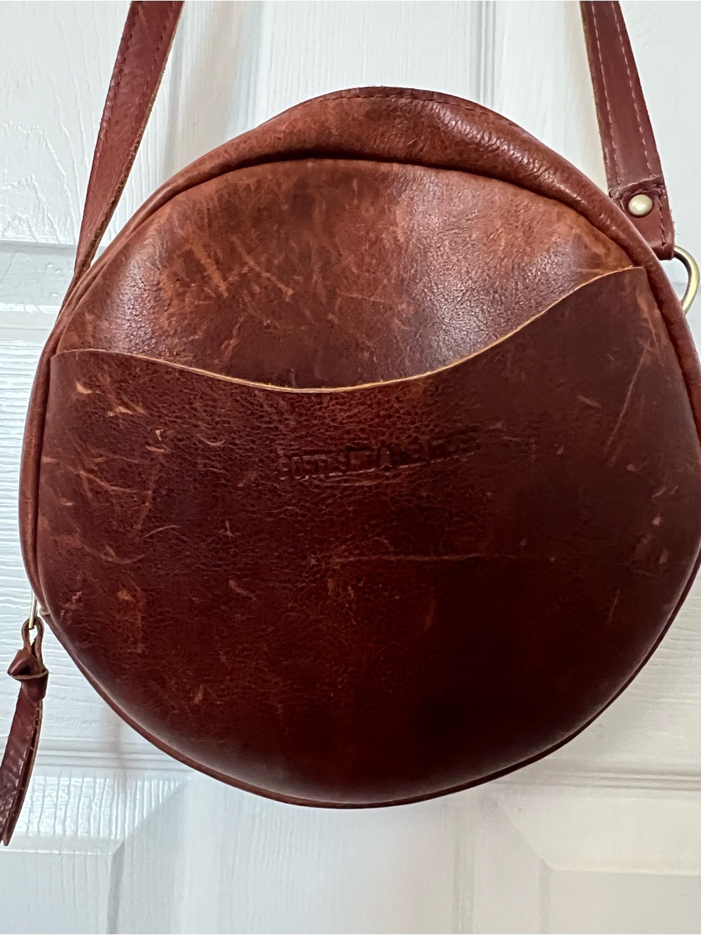 Portland Leather round women’s bag.